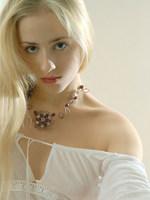 mysterious blonde with cat like features has a very sensual series here.