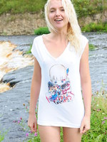 blonde cutie on the river bank.