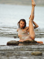 olha getting dirty on the beach.