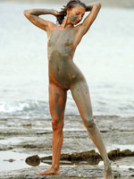 olha getting dirty on the beach.