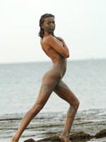 olha getting dirty on the beach.