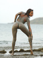 olha getting dirty on the beach.